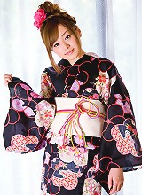 Beautiful gravure idol angel in a cute short dress and boots